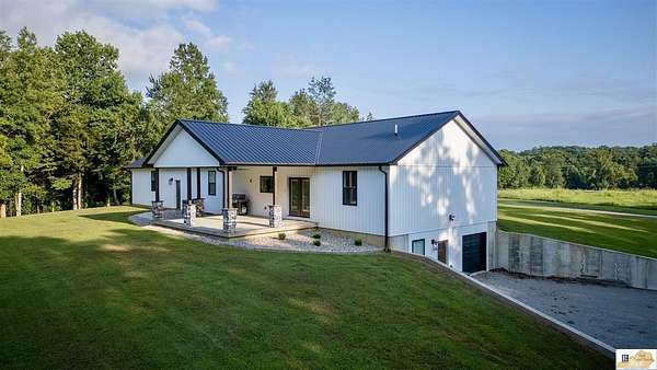 7.7 Acres of Residential Land with Home for Sale in Russell Springs, Kentucky