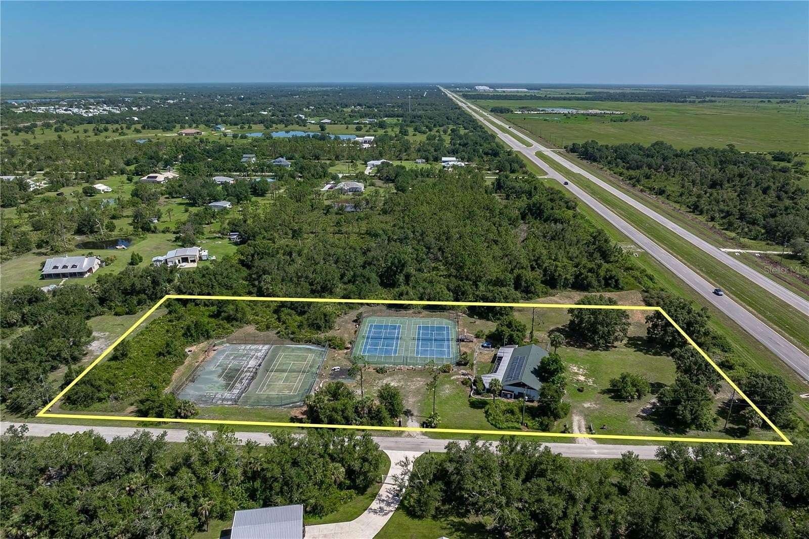 4.59 Acres of Land with Home for Sale in Punta Gorda, Florida