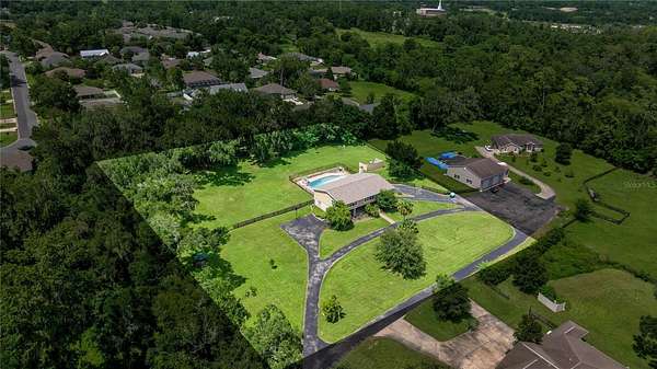 1.9 Acres of Residential Land with Home for Sale in Ocala, Florida