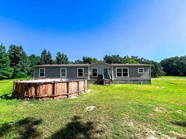 10 Acres of Residential Land with Home for Sale in Winnsboro, Texas