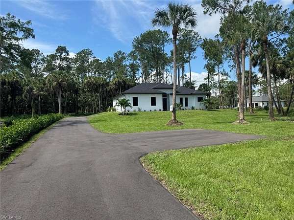 2.5 Acres of Residential Land with Home for Sale in Naples, Florida
