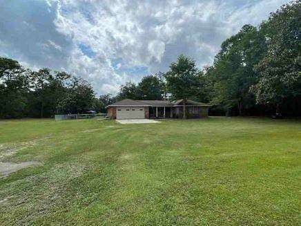 2 Acres of Land with Home for Auction in Grand Bay, Alabama