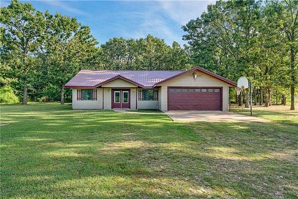 10 Acres of Land with Home for Sale in Watts, Oklahoma