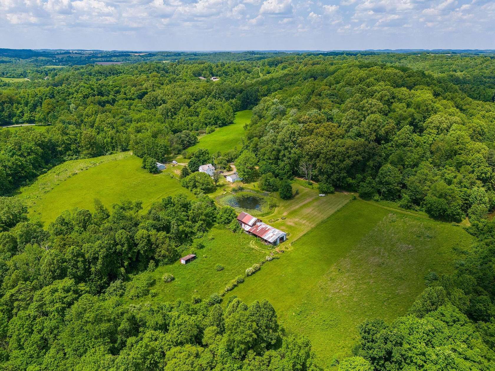 154 Acres of Agricultural Land with Home for Sale in Laurelville, Ohio