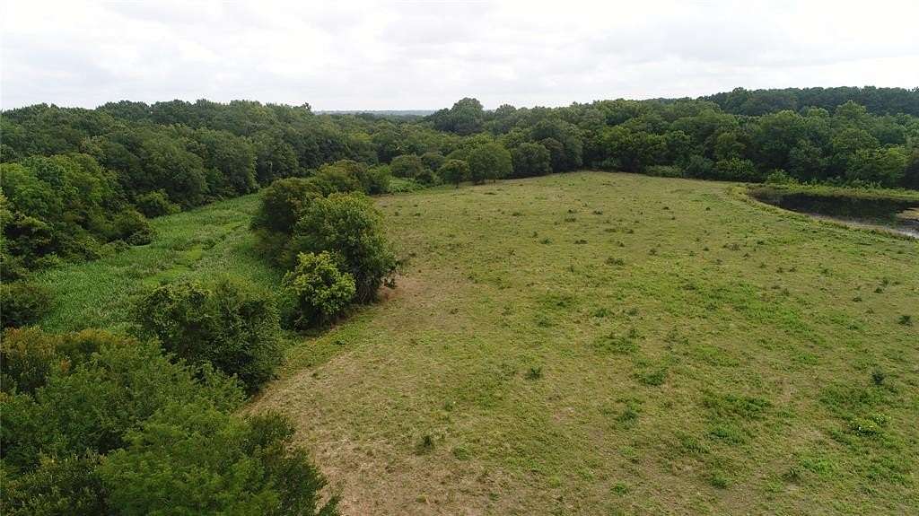 70 Acres of Land with Home for Sale in De Kalb, Texas