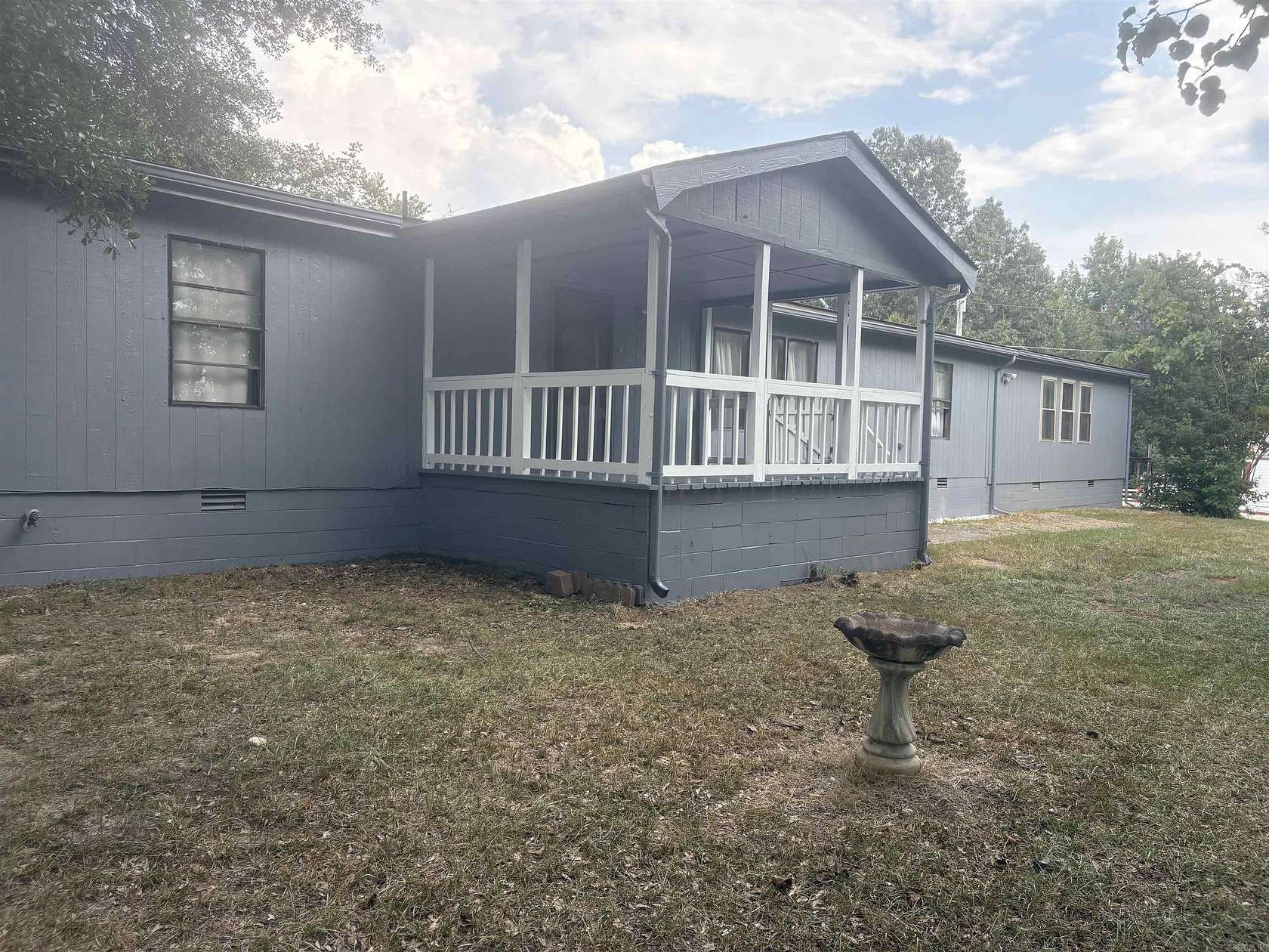 1.64 Acres of Land with Home for Sale in Benton, Arkansas