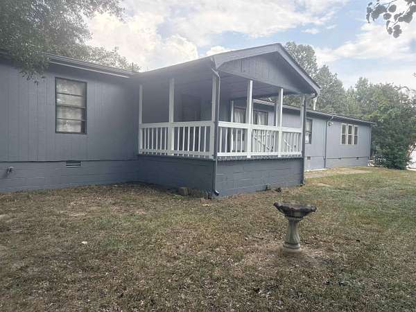 1.64 Acres of Land with Home for Sale in Benton, Arkansas