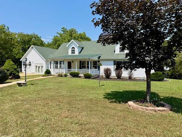 38 Acres of Recreational Land with Home for Sale in Yukon, Missouri