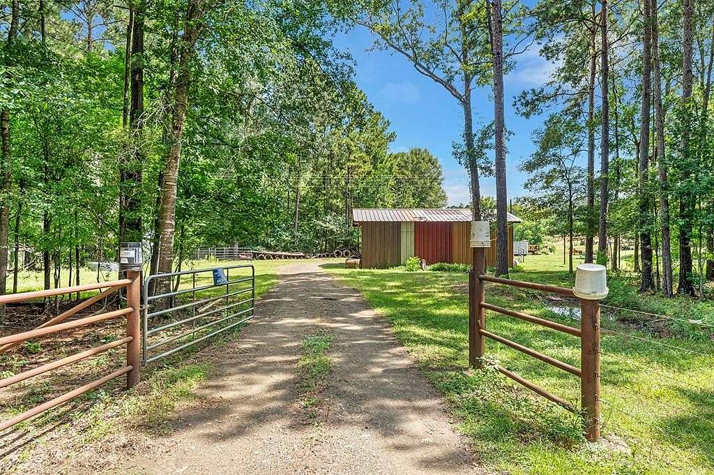 42.2 Acres of Recreational Land with Home for Sale in Pineland, Texas