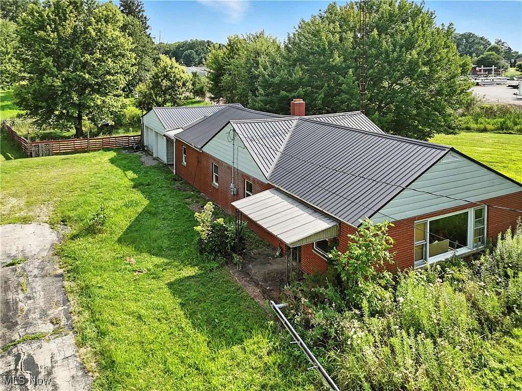 3 Acres of Residential Land with Home for Sale in Beloit, Ohio