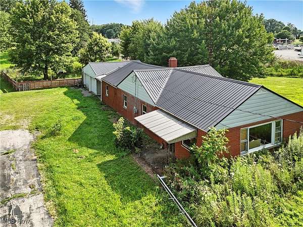 3 Acres of Residential Land with Home for Sale in Beloit, Ohio