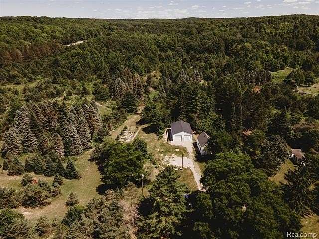 45 Acres of Land with Home for Sale in Mancelona, Michigan