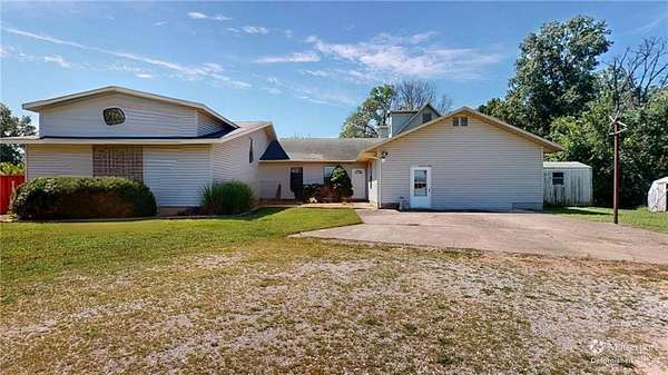 8 Acres of Residential Land with Home for Auction in Nevada, Missouri