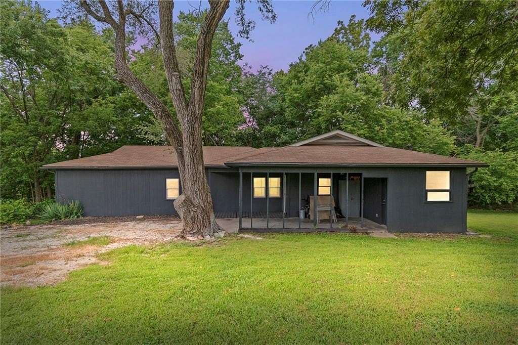 8.4 Acres of Land with Home for Sale in Warrensburg, Missouri