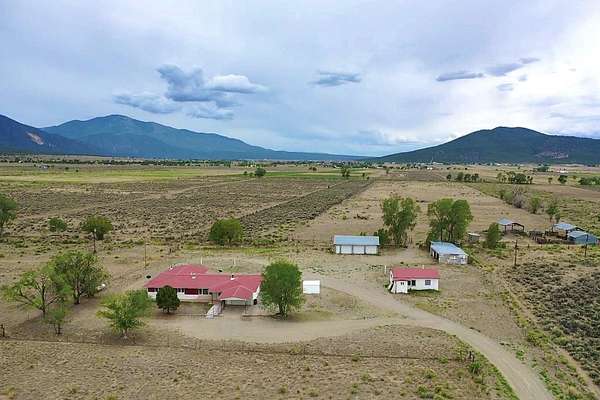 17.8 Acres of Land with Home for Sale in Cerro, New Mexico