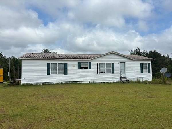 6.6 Acres of Residential Land with Home for Sale in Hazlehurst, Georgia