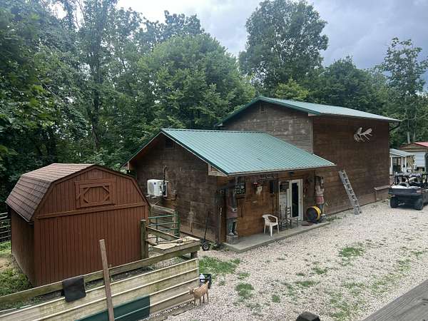 80 Acres of Recreational Land with Home for Sale in Irvine, Kentucky