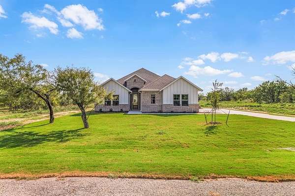2 Acres of Residential Land with Home for Sale in Brock, Texas