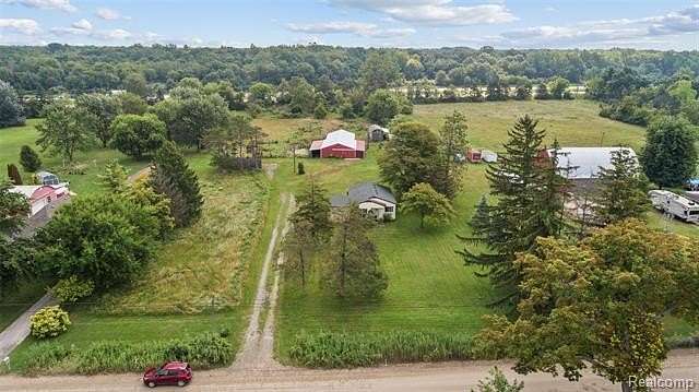 2.47 Acres of Residential Land with Home for Sale in New Boston, Michigan