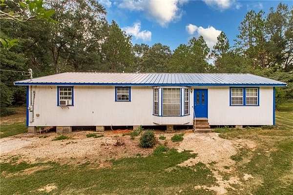 6.3 Acres of Residential Land with Home for Sale in Amite, Louisiana