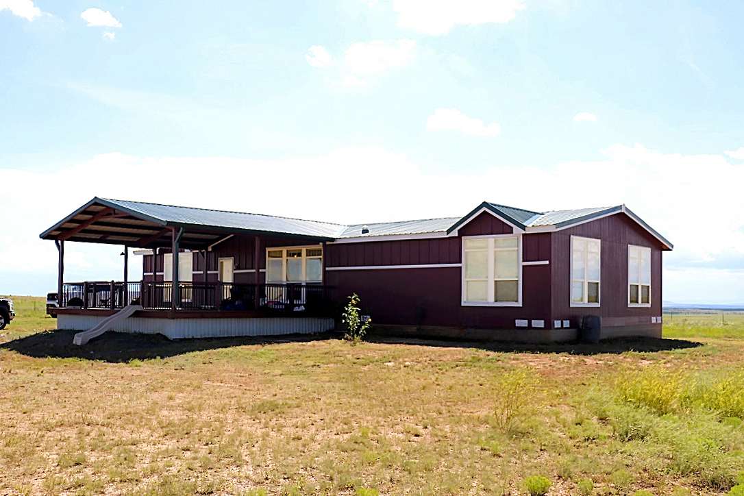 127 Acres of Recreational Land with Home for Sale in Roy, New Mexico