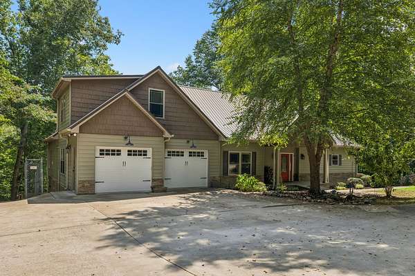 48.9 Acres of Agricultural Land with Home for Sale in Hohenwald, Tennessee