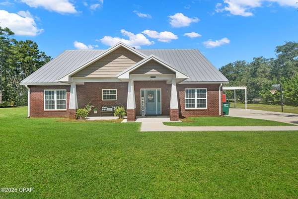 3.29 Acres of Residential Land with Home for Sale in Panama City, Florida