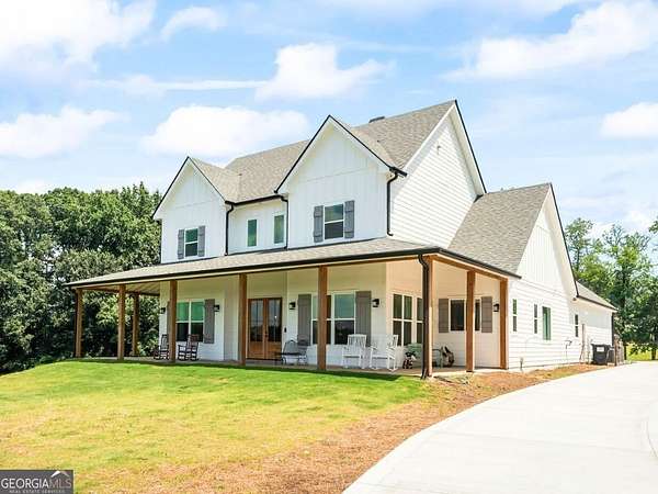 1.69 Acres of Residential Land with Home for Sale in Cumming, Georgia