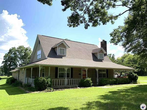 9.44 Acres of Residential Land with Home for Sale in Atlanta, Texas