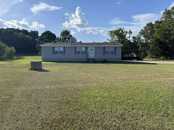 5.4 Acres of Residential Land with Home for Sale in Buckner, Arkansas