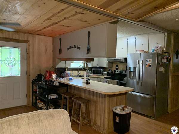 2 Acres of Residential Land with Home for Sale in Atlanta, Texas