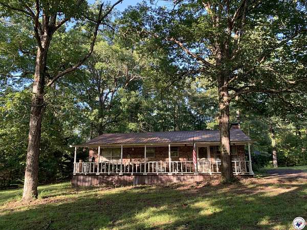 2 Acres of Residential Land with Home for Sale in Atlanta, Texas