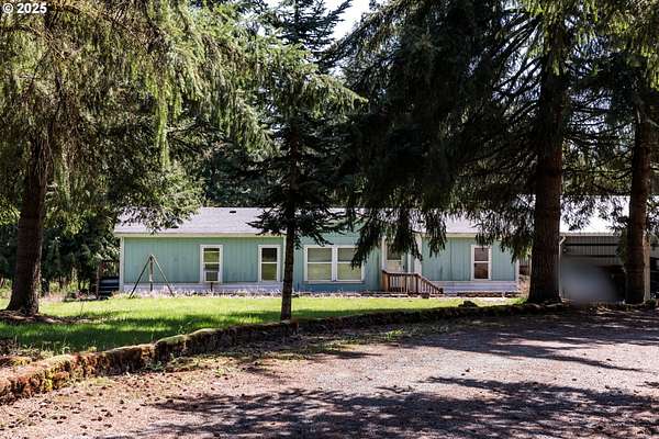 6.84 Acres of Residential Land with Home for Sale in Deer Island, Oregon