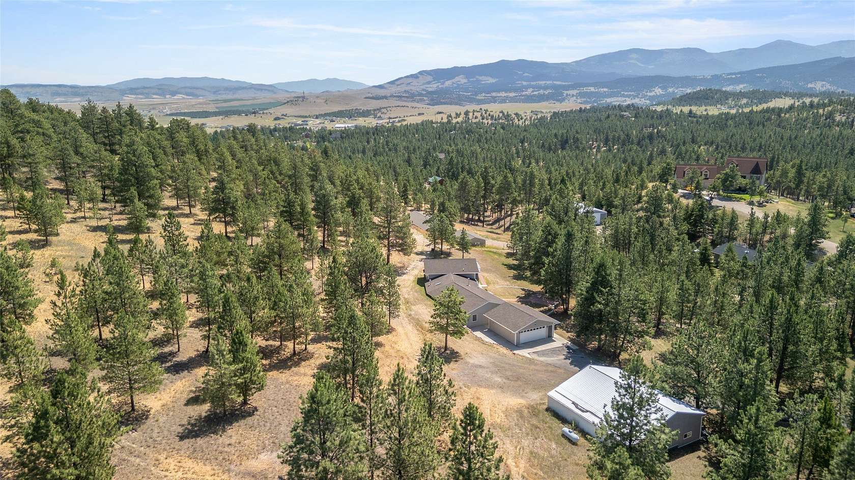 5 Acres of Residential Land with Home for Sale in Clancy, Montana