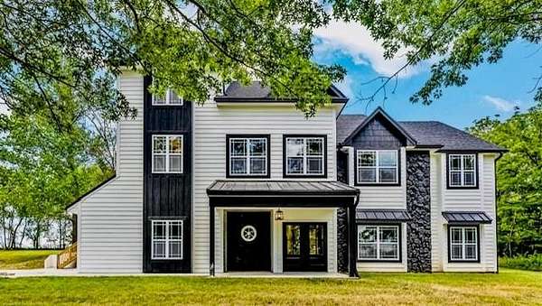 10 Acres of Land with Home for Sale in Grain Valley, Missouri