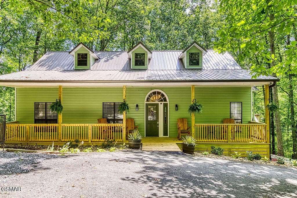 5.22 Acres of Residential Land with Home for Sale in Sevierville, Tennessee