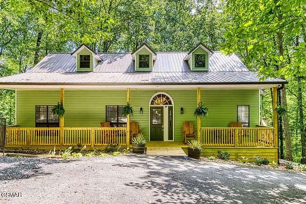 5.22 Acres of Residential Land with Home for Sale in Sevierville, Tennessee