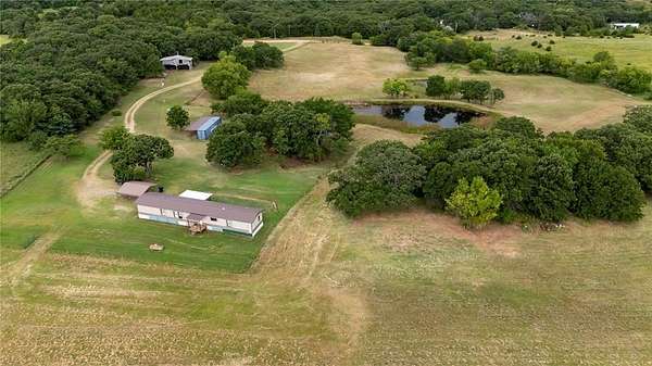 20 Acres of Agricultural Land with Home for Sale in Sparks, Oklahoma
