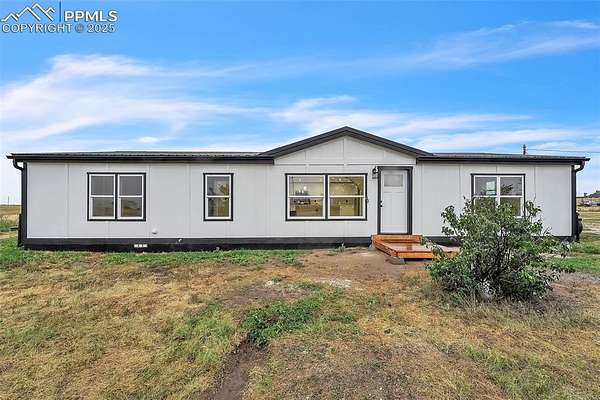 5 Acres of Residential Land with Home for Sale in Yoder, Colorado