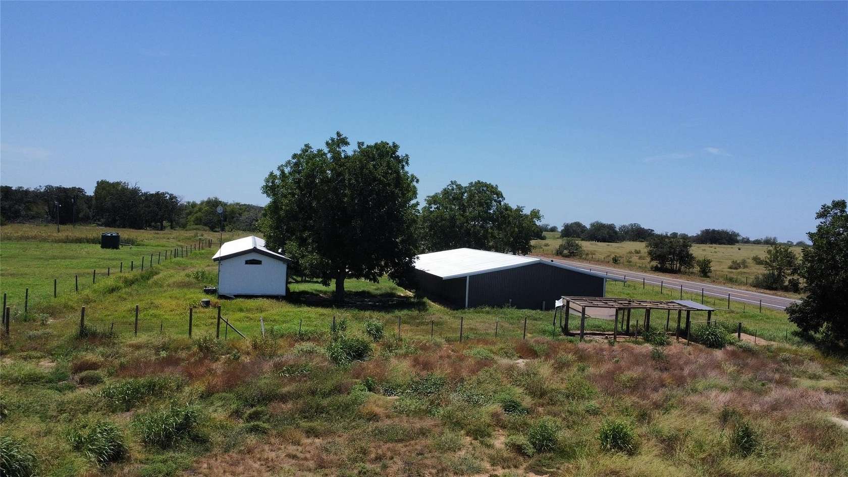 2 Acres of Residential Land with Home for Sale in Waelder, Texas