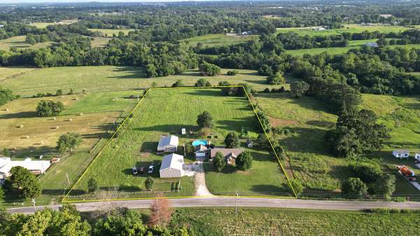 5 Acres of Residential Land with Home for Sale in Bolivar, Missouri