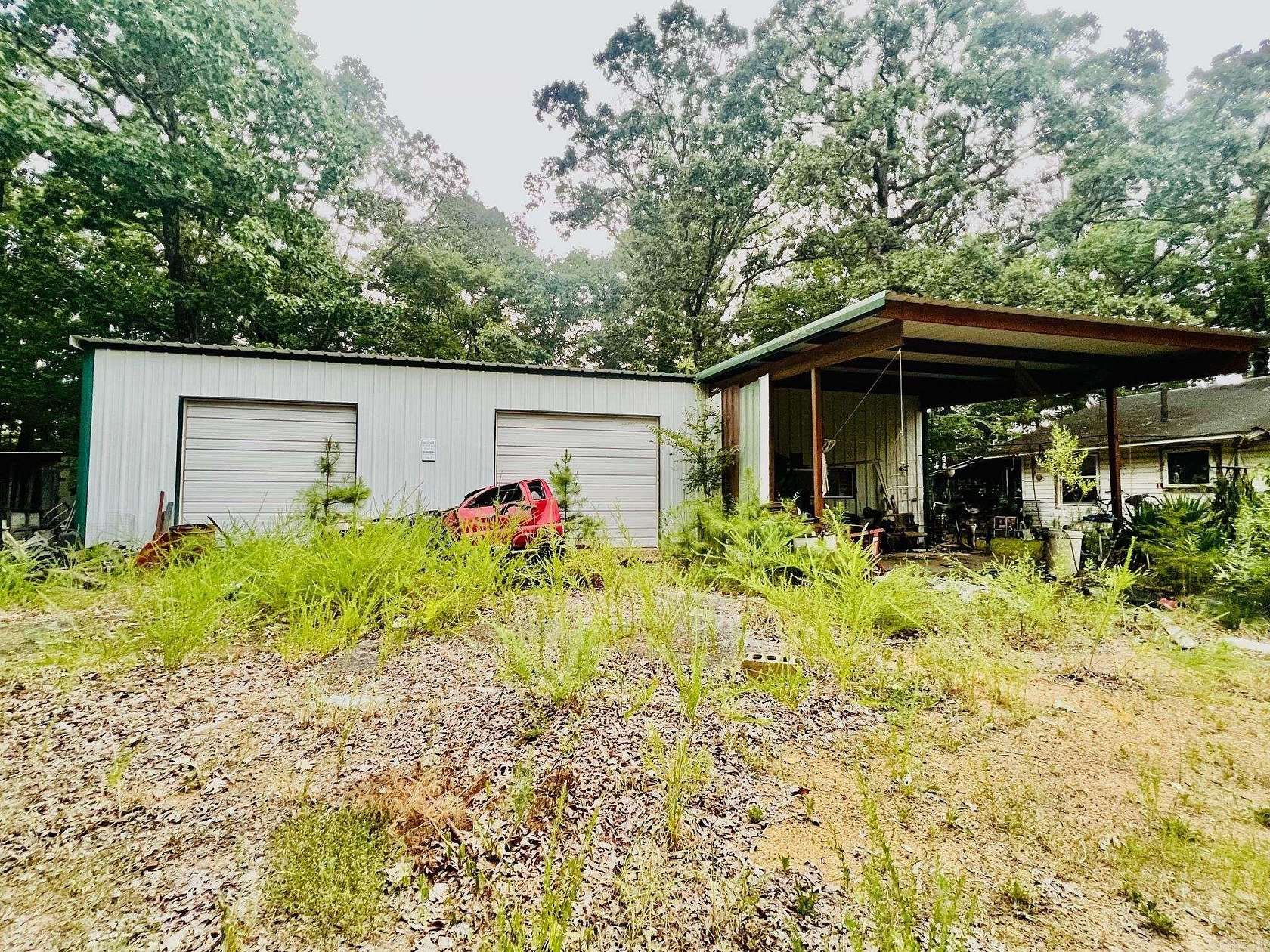 9 Acres of Land with Home for Sale in Mena, Arkansas