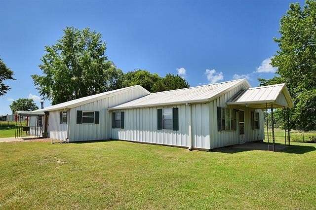 106 Acres of Land with Home for Sale in Braggs, Oklahoma