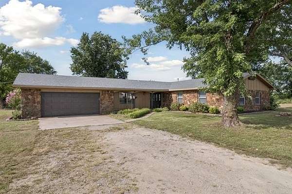 10 Acres of Land with Home for Sale in Okmulgee, Oklahoma