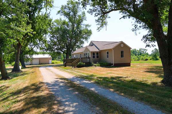 6.73 Acres of Residential Land with Home for Sale in Coopersville, Michigan