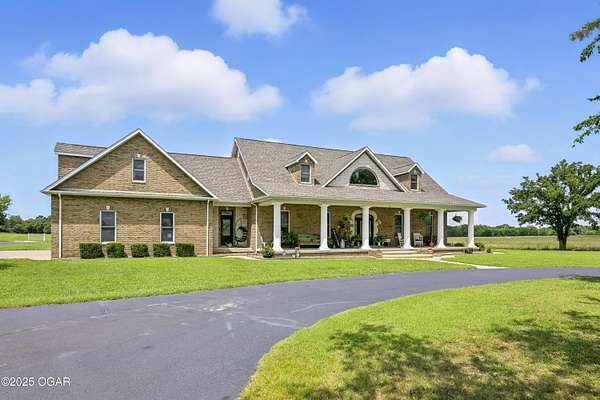 165 Acres of Land with Home for Sale in Joplin, Missouri