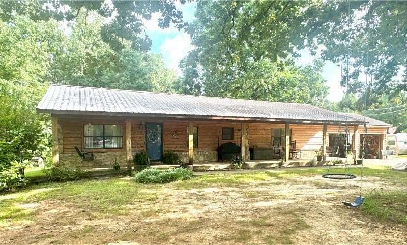 4.3 Acres of Residential Land with Home for Sale in Saltillo, Mississippi