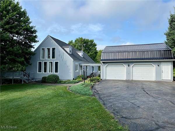 80.3 Acres of Land with Home for Sale in Carrollton, Ohio