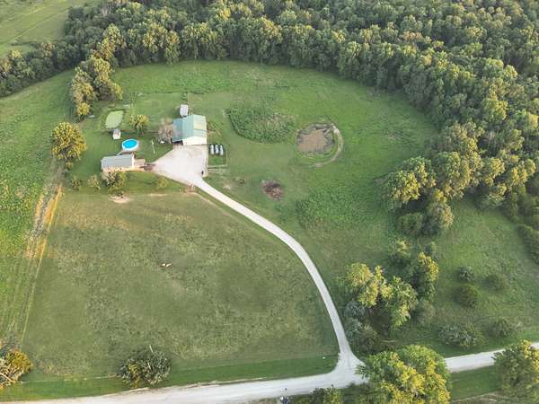 10 Acres of Land with Home for Sale in Clifton Hill, Missouri