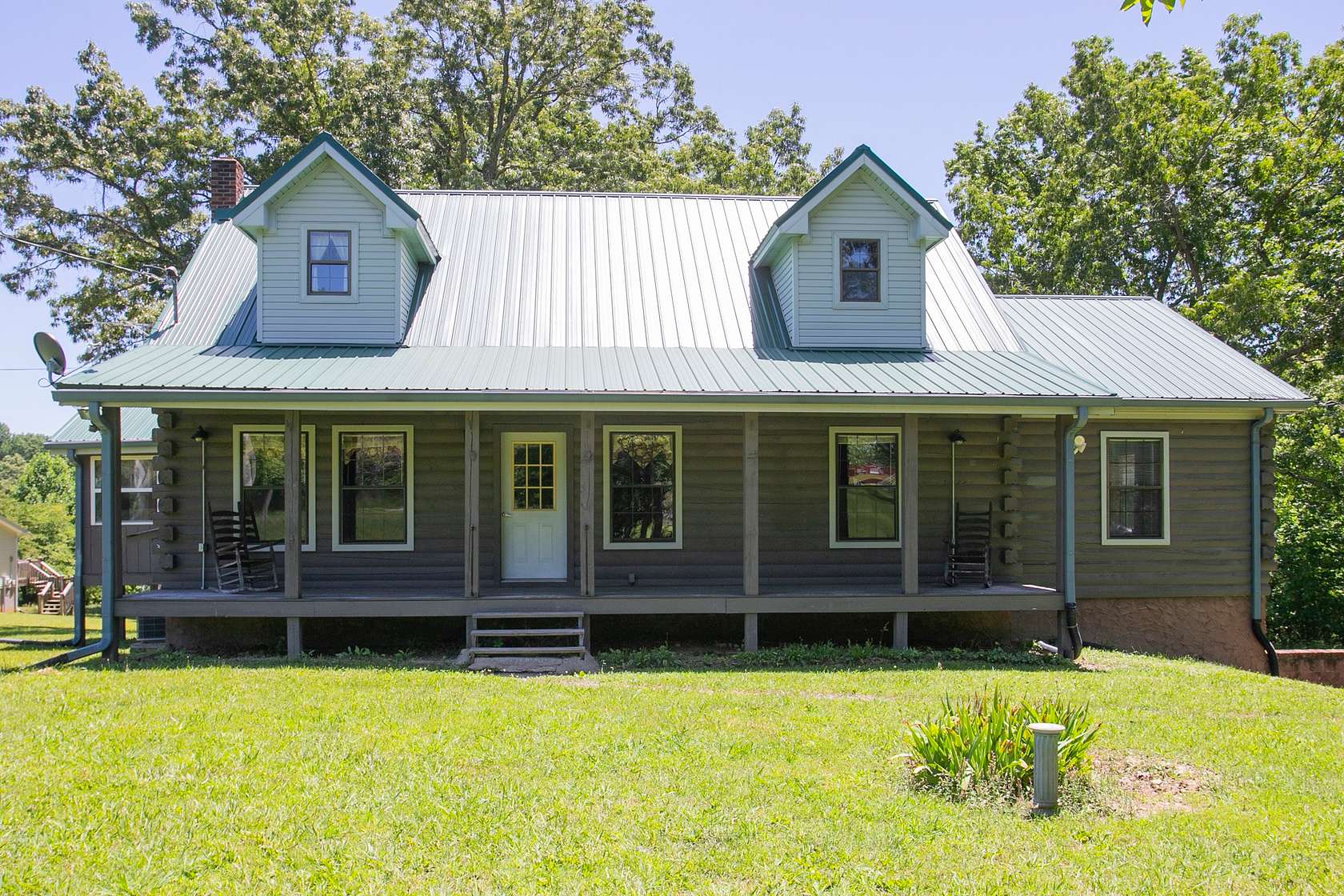 6.54 Acres of Residential Land with Home for Sale in Burns, Tennessee